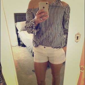 Express cold shoulder navy white and gold top.